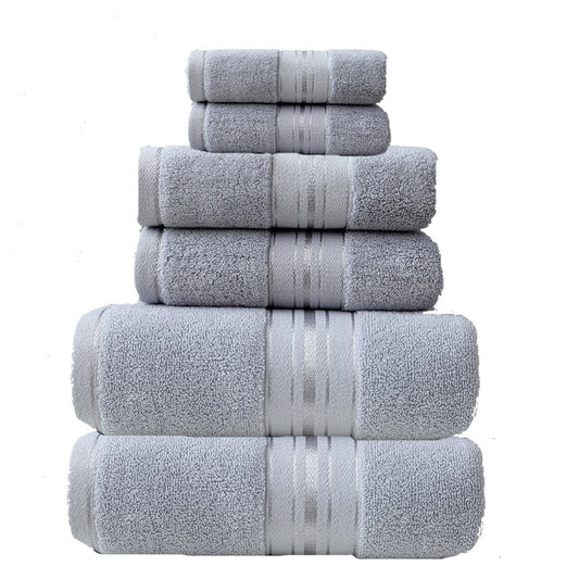 Stack of gray towels with striped patterns on a white background