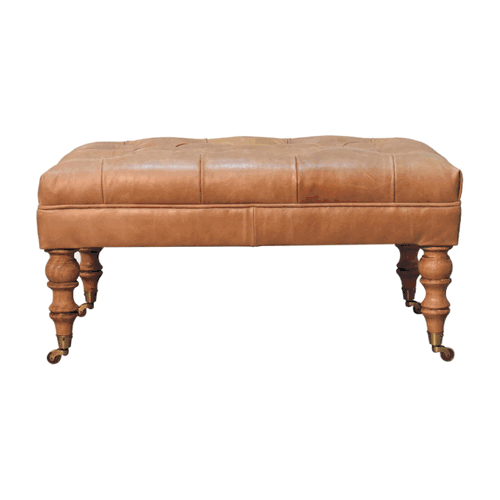 Image of handcrafted leather ottomans. Built with solid frames and premium leather accents, perfect as footresst,seat or accent decor