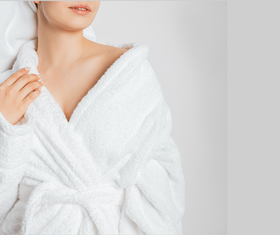 Image of a female wearing a white bath robe