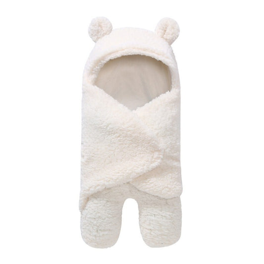 White baby bunting with bear ears on a white background