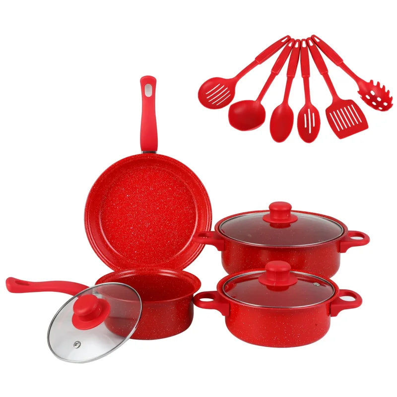 Red cookware set with pots, pans, and measuring utensils on a white background