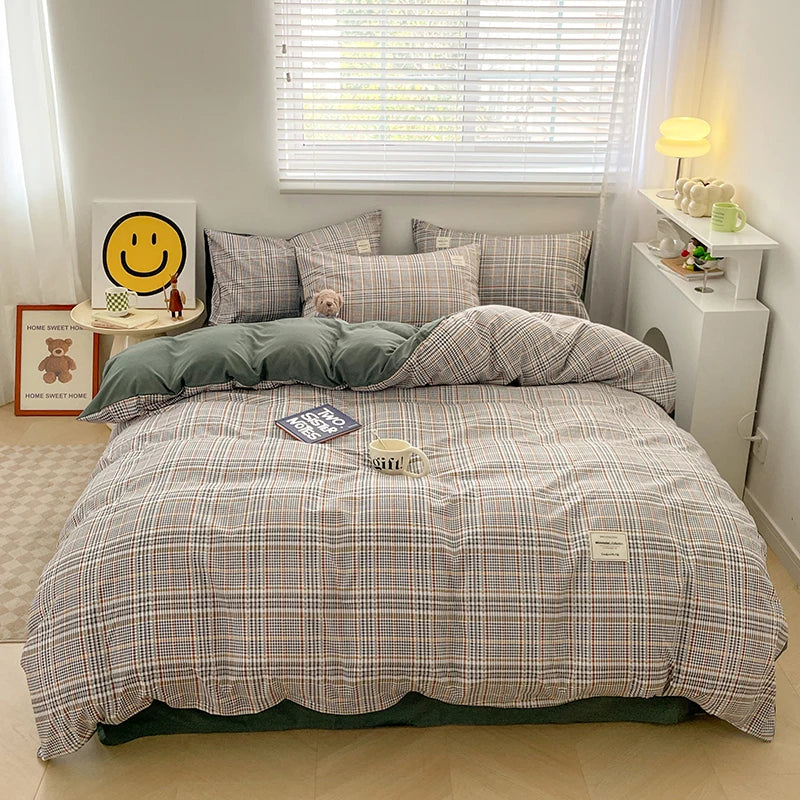 Bed with plaid bedding in a bedroom setting