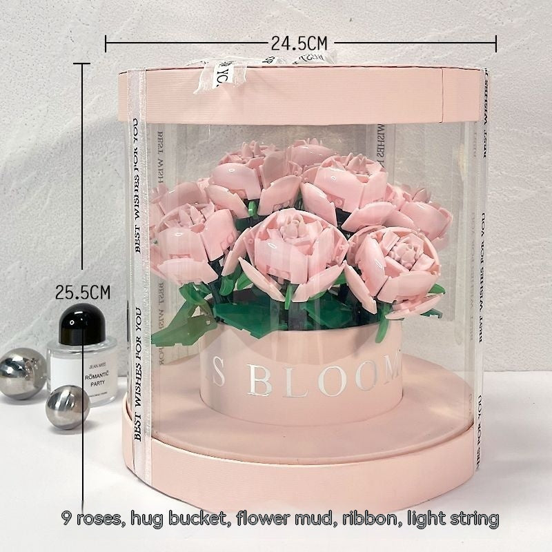 Decorative flower arrangement in a pink box with measurements and product details.