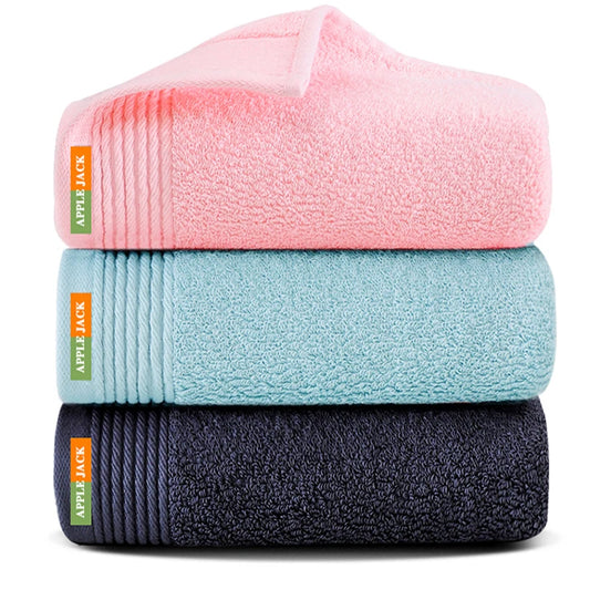 Stack of three folded towels in pink, blue, and black with 'Apple Jack' branding.