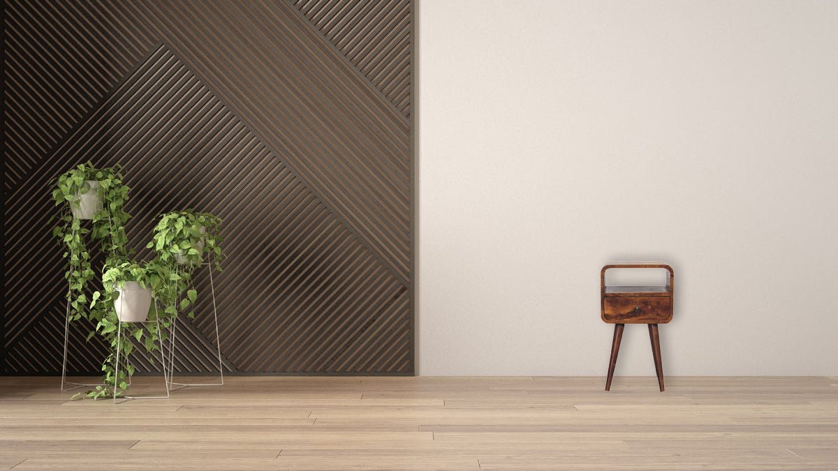 Mini Chestnut Curve Open Nightstand with 1 drawer, 1 open slot, and Nordic style legs. Nightstand positioned in a living room space by the wall