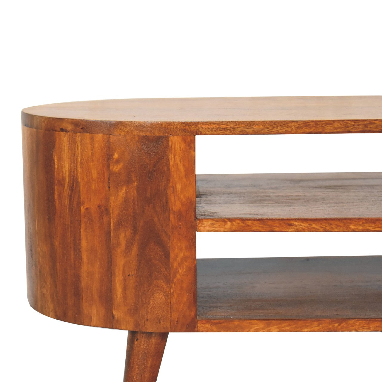 Cortez Chestnut Media Unit made from solid mango wood with two open shelves and chestnut finish. Close up view of shelves