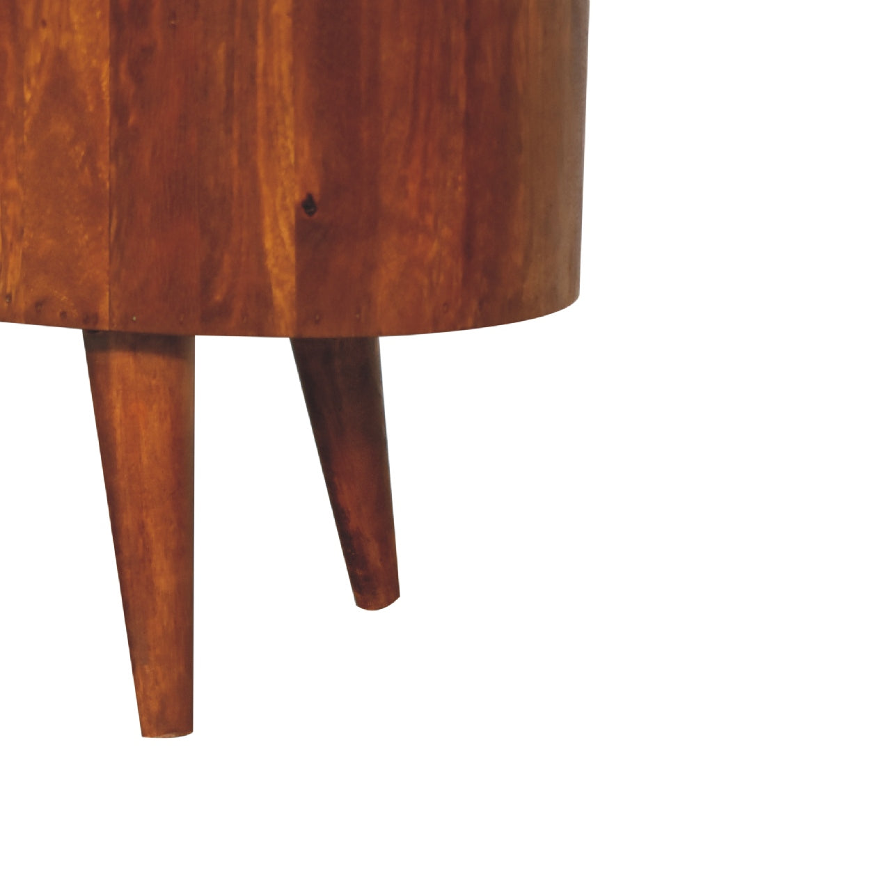 Cortez Chestnut Media Unit made from solid mango wood with two open shelves and chestnut finish. Leg view