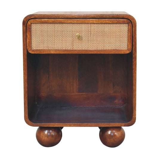Chestnut woven chest with single drawer, shiny knob, and solid mango wood legs.