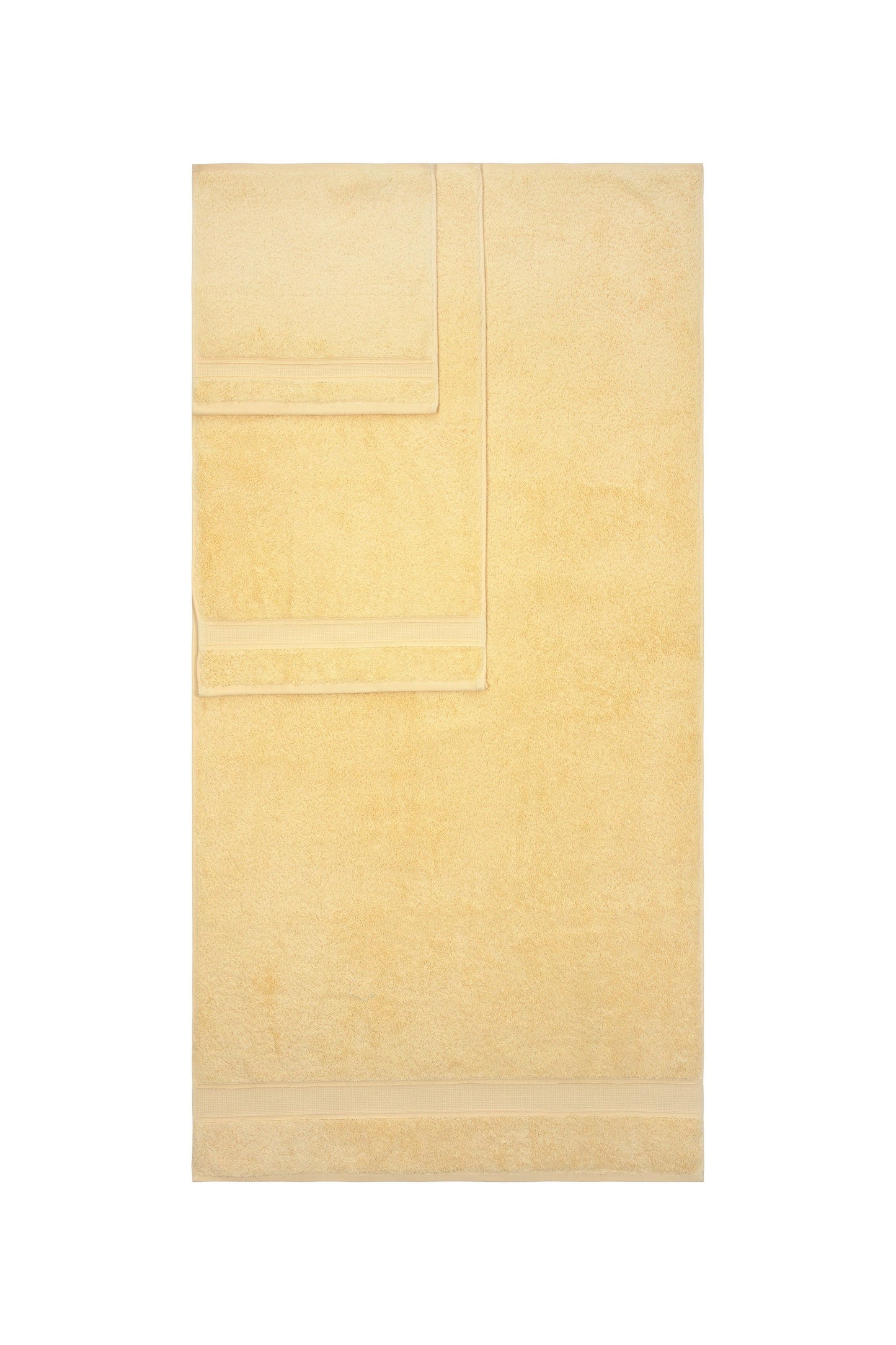 Yellow bath towel set on a white background