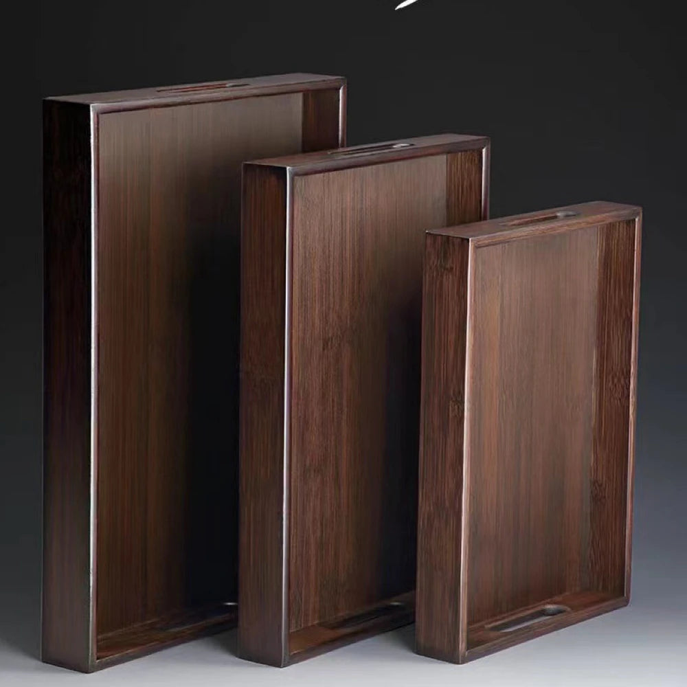 Three wooden boxes of different sizes on a gradient background