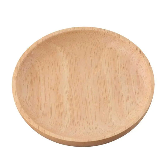 Round wooden cutting board on a white background
