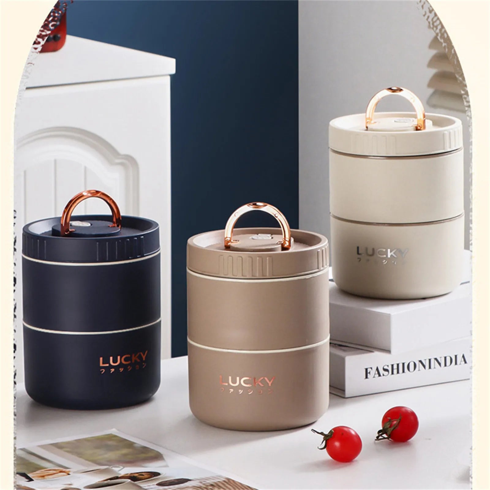 Three Lucky brand containers on a surface with books and tomatoes in the background