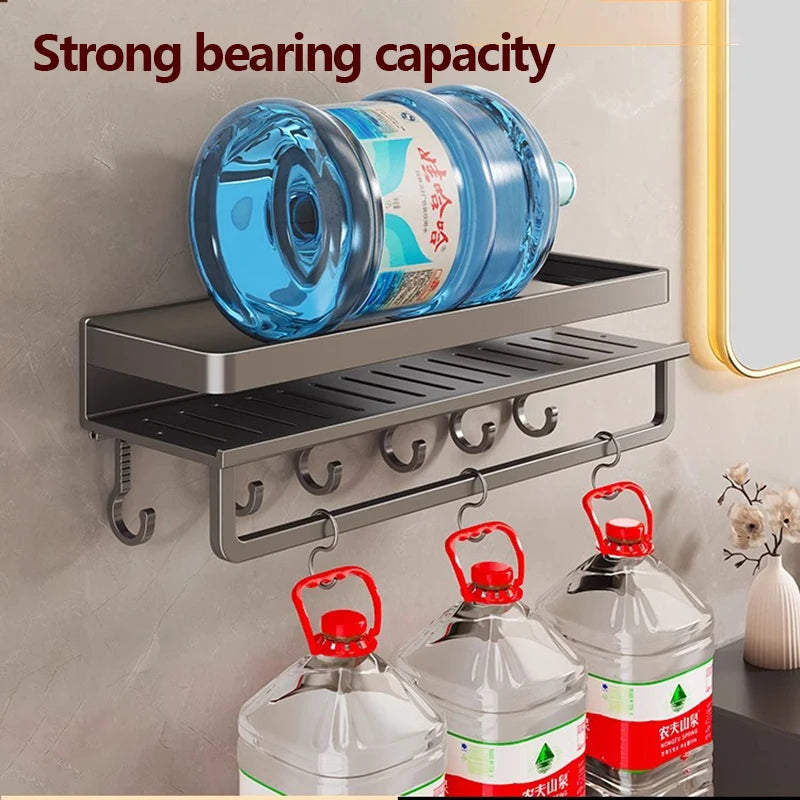 Wall-mounted shelf with hooks holding water bottles against a neutral wall.