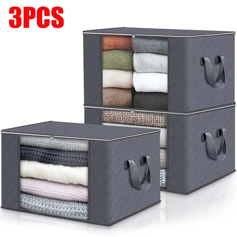 Two gray storage cubes with handles filled with folded clothes on a white background, labeled '3PCS'.