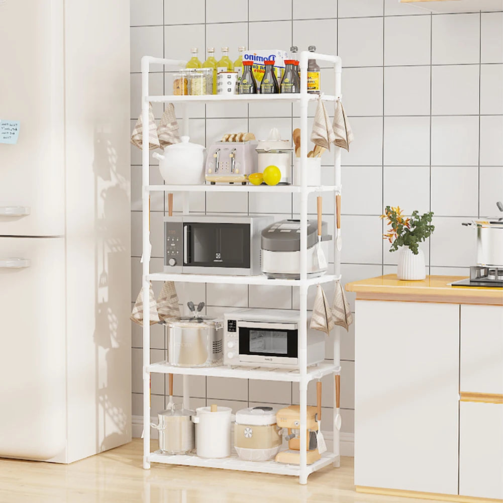 White metal shelf in a kitchen with various appliances and items on the shelves.