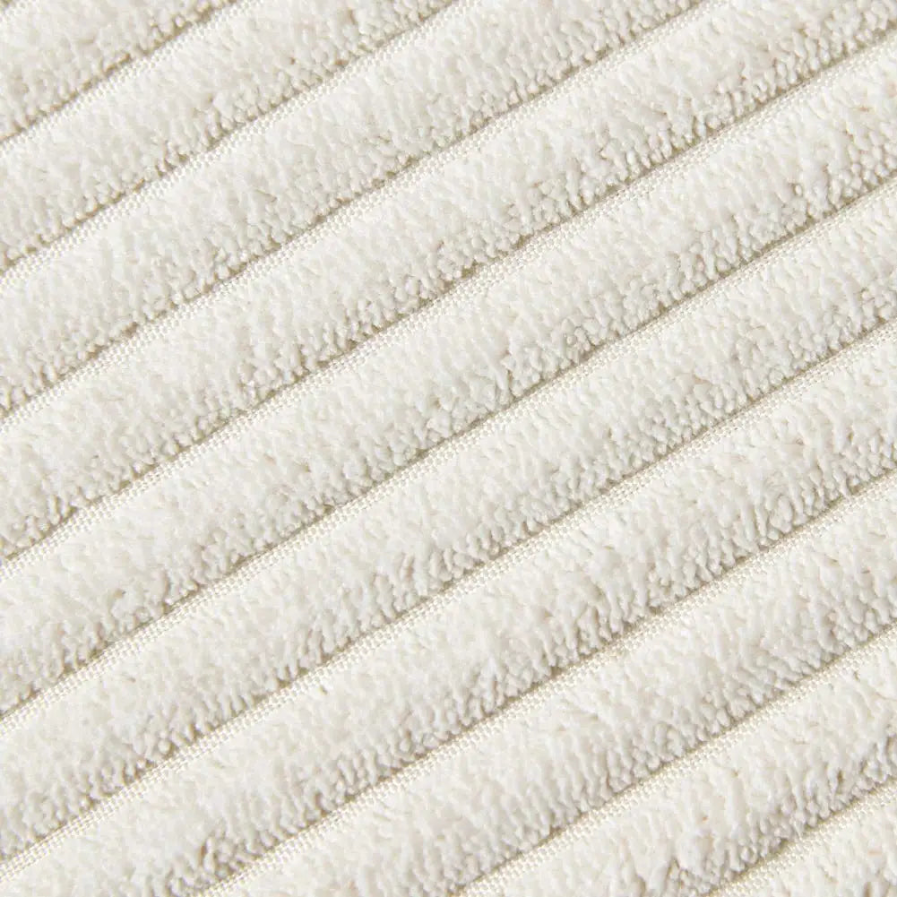 Close-up of a textured beige fabric with horizontal lines