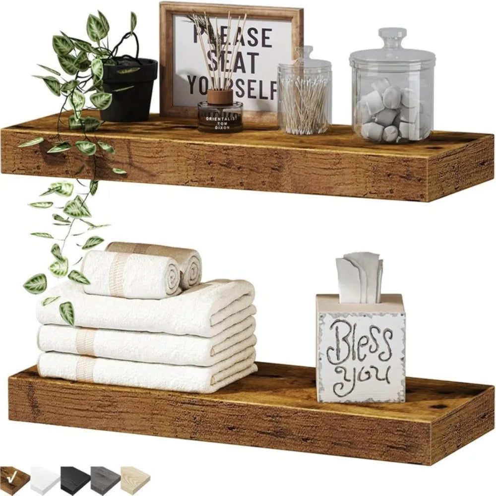 Wooden shelves with decorative items including towels, plants, and a 'Bless you' box.