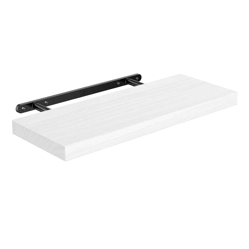 White wall shelf with black bracket on a white background