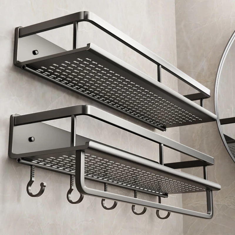 Bathroom shelf with hooks on a tiled wall