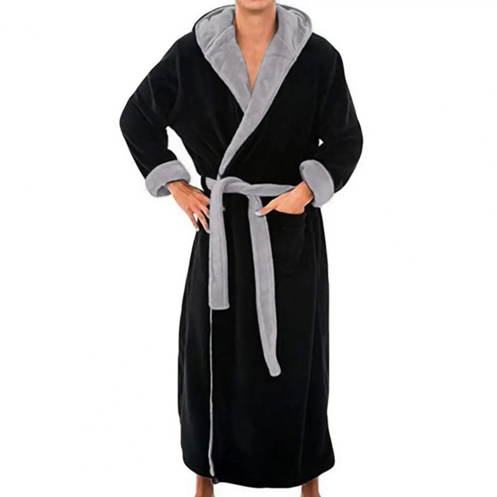 Black robe with gray trim worn by a person on a white background