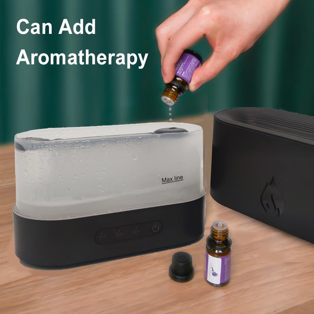 Hand adding essential oil to a diffuser with text 'Can Add Aromatherapy' on a wooden surface.