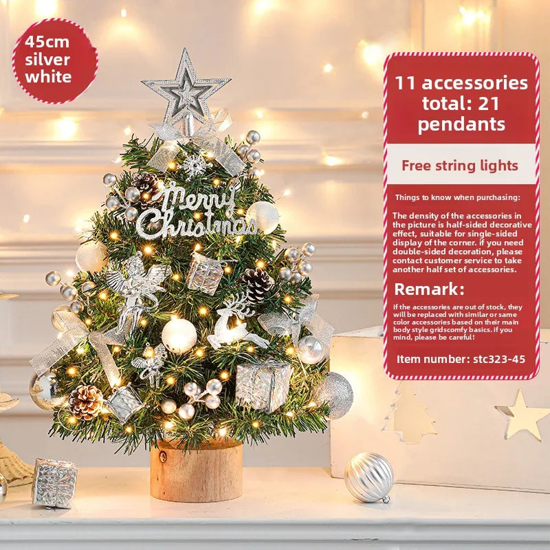 Decorative Christmas tree with lights and ornaments on a table, accompanied by a product description card.