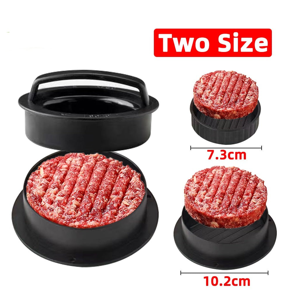 Hamburger press with two sizes of ground meat on a white background