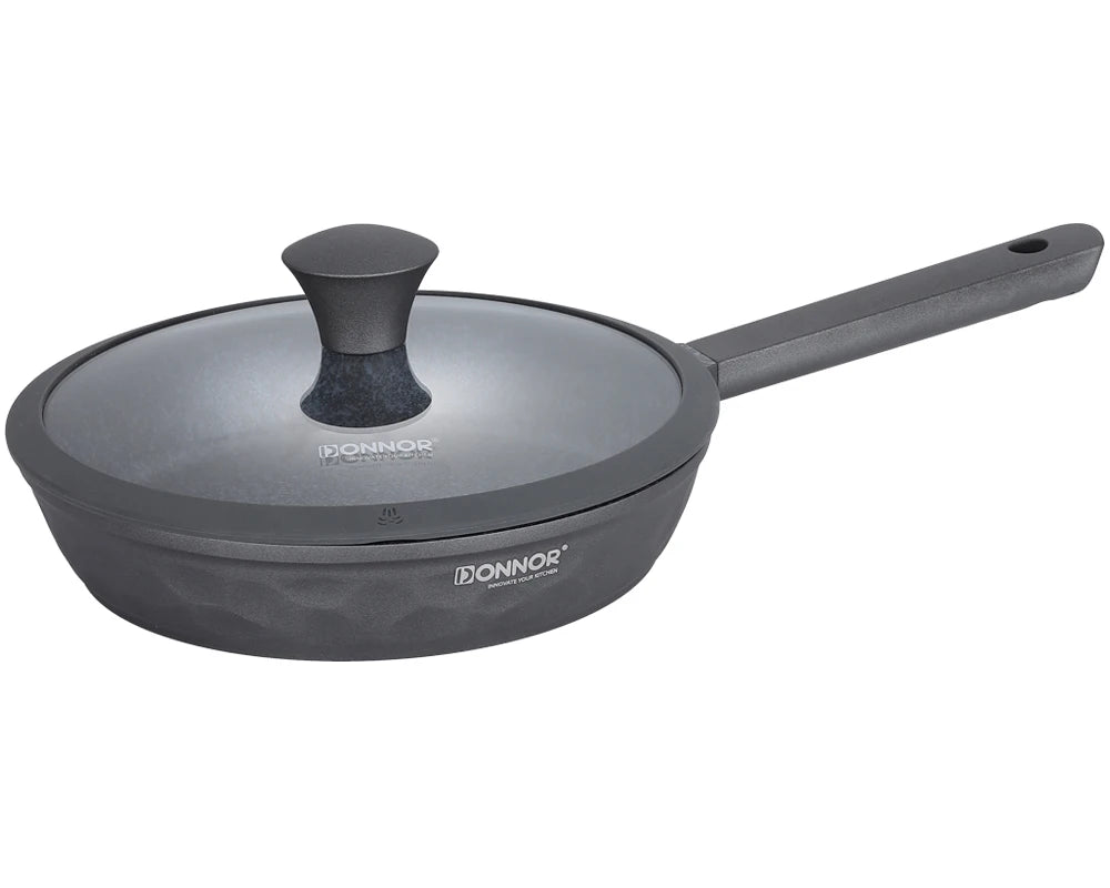 Gray frying pan with lid on a white background, featuring the Donnor brand.