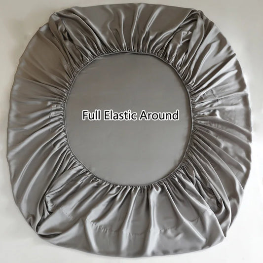 Gray round seat cover with full elastic around on a white background