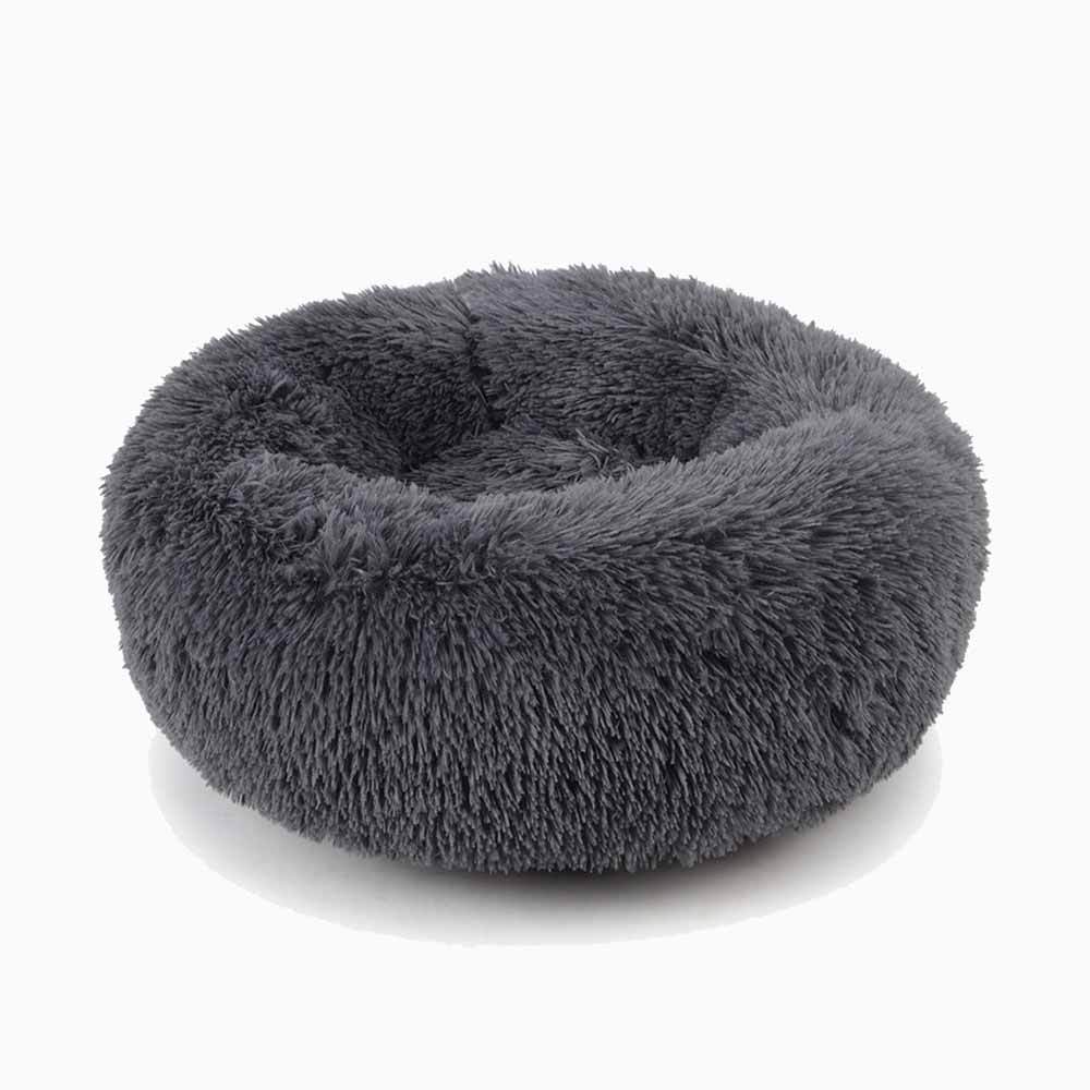 Fluffy gray pet bed on a white background