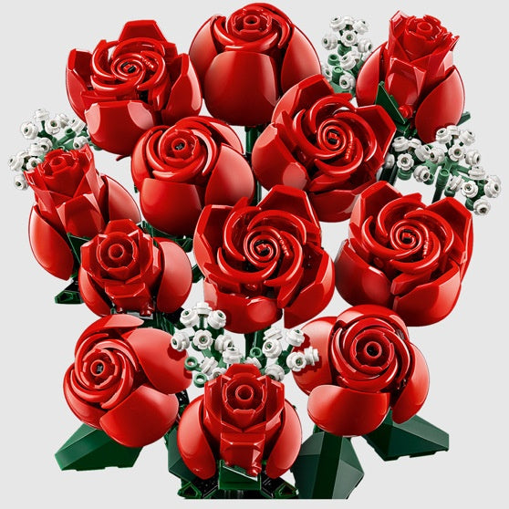 Bouquet of red roses made from interlocking bricks on a light gray background