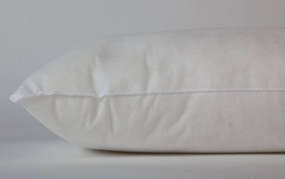 White pillow on a light gray background